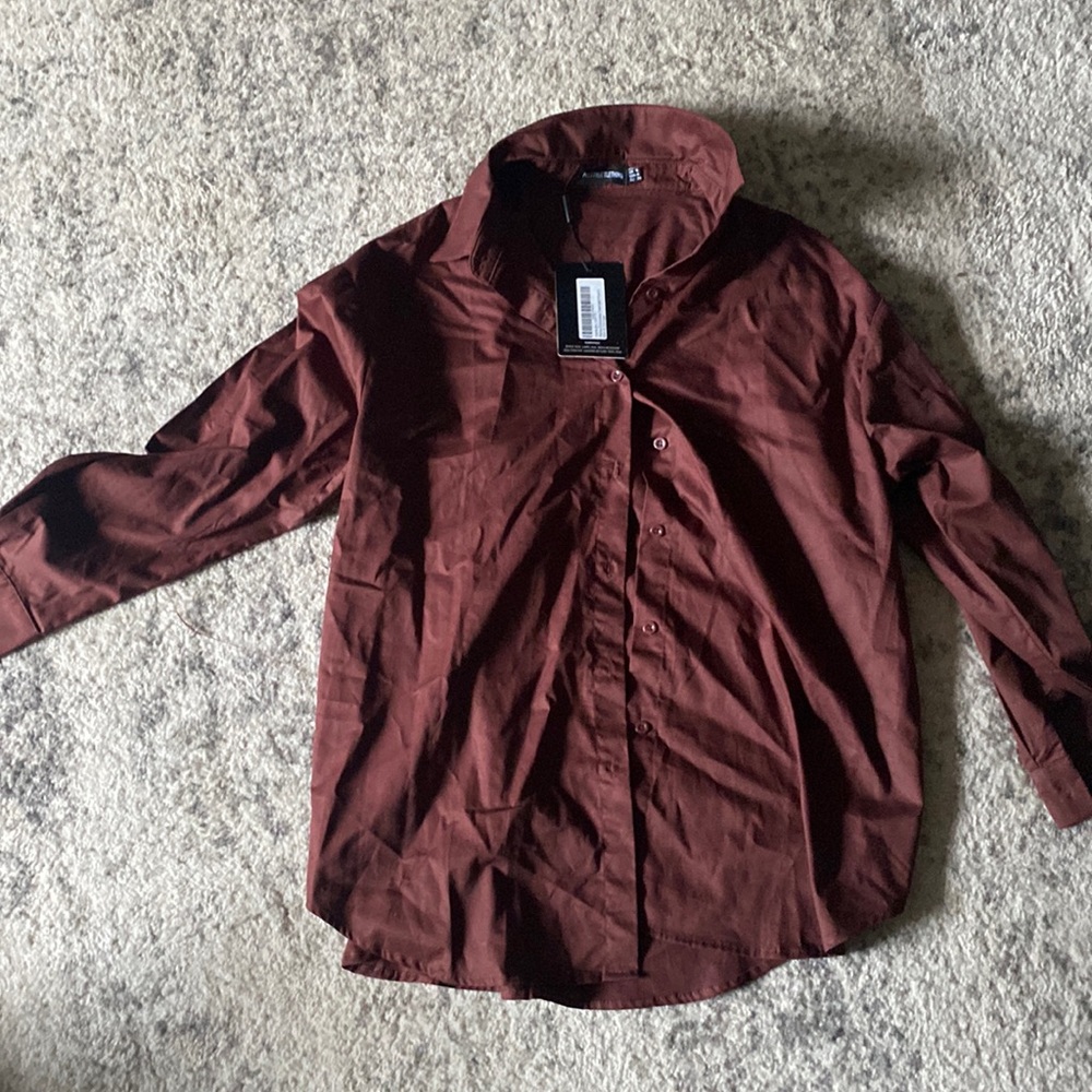 Dress shirt. Can be work as a oversized shirt.